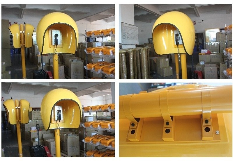 the yellow outdoor telephone booth